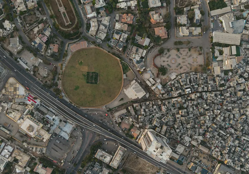 An aerial view of a cricket stadium in the city